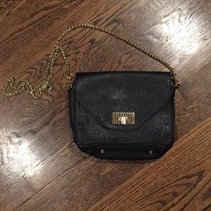 Express black and gold crossbody bag